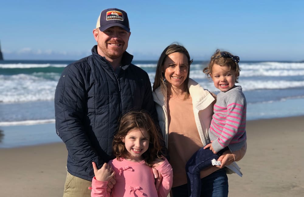 Tucker from Touchmark Central Office in Beaverton, Oregon with his family at the beach