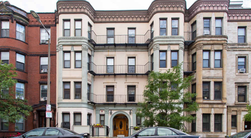 Three-story building with balconies and windows at 15-25 Hemenway Apartments in Boston, Massachusetts