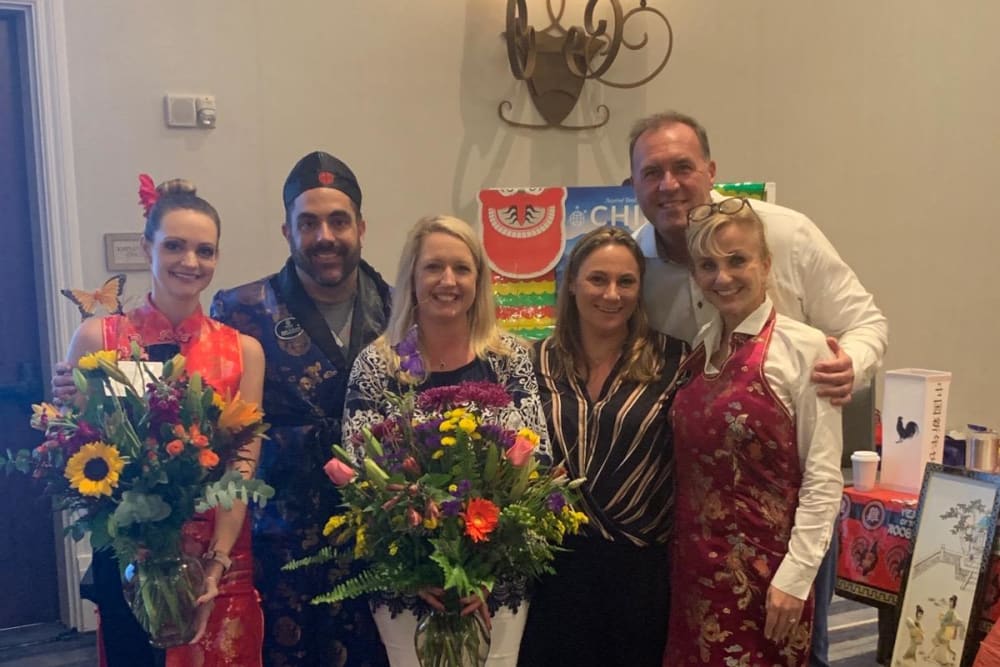 Staff members from the China Inspired Destinations event at Inspired Living in Bradenton, Florida.