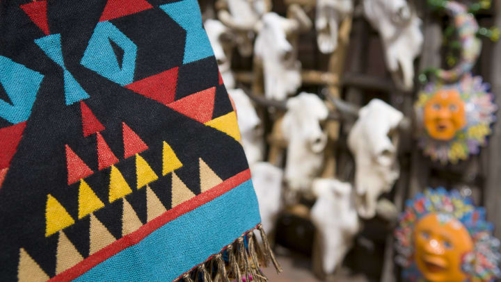 Blanket and cow skulls in Southwest-style marketplace