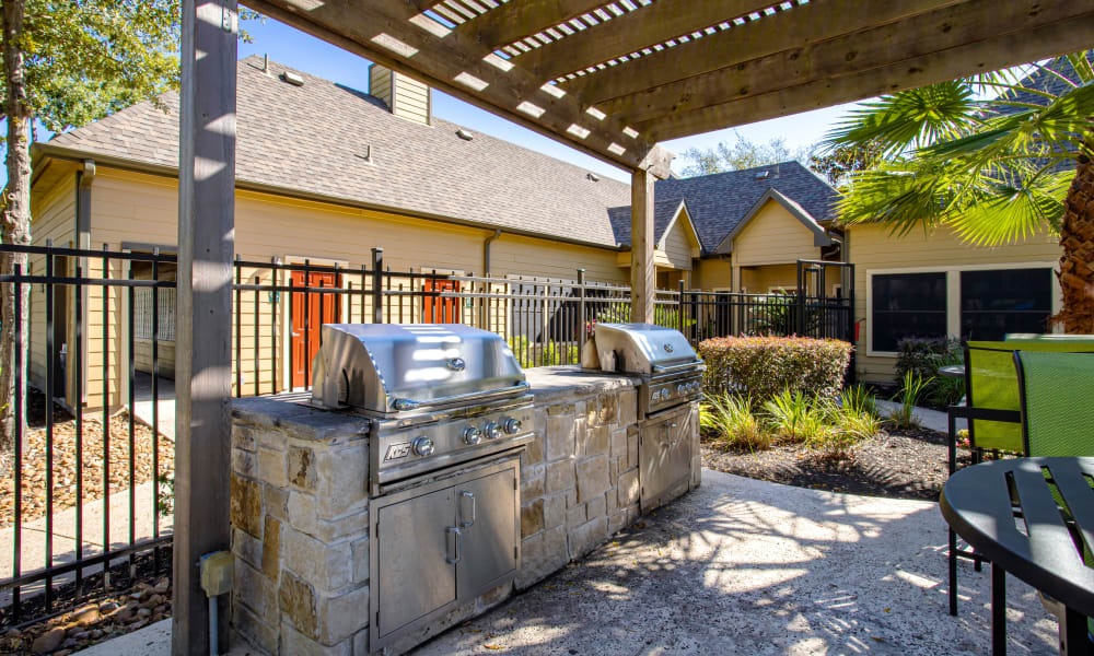 A grilling area next to the pool at Regatta Bay in Seabrook, Texas