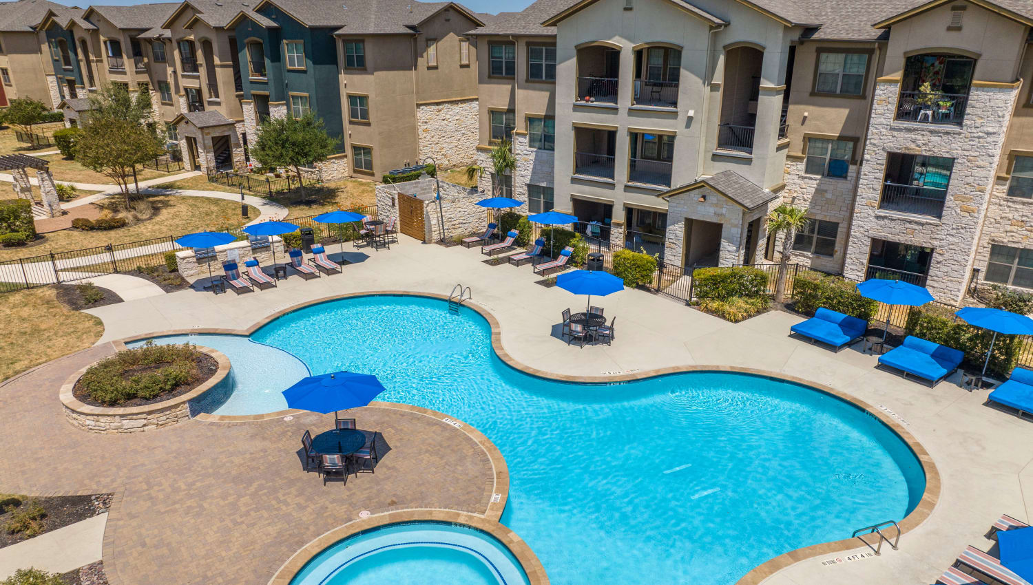 Early morning view of the pool area at Carrington Oaks in Buda, Texas