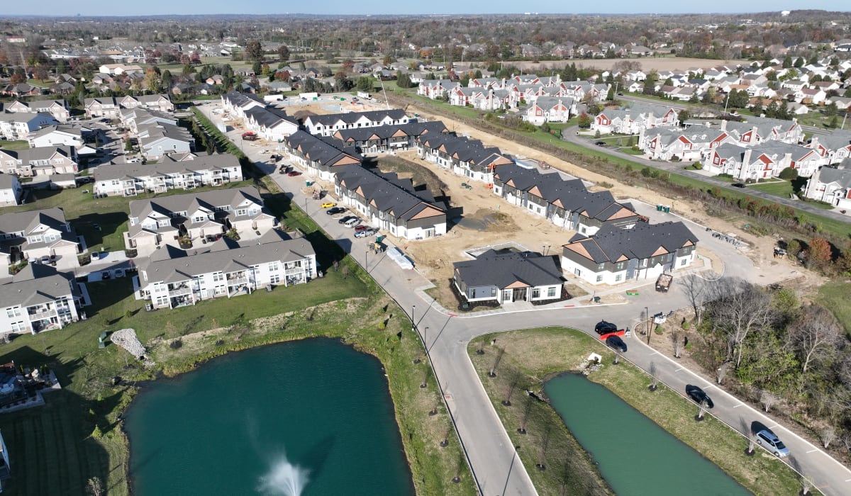 Community entrance and lakes with fountains at Meribel in Springboro, Ohio