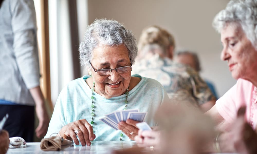 Residents playing cards in the game room at Royalton Woods in North Royalton, Ohio