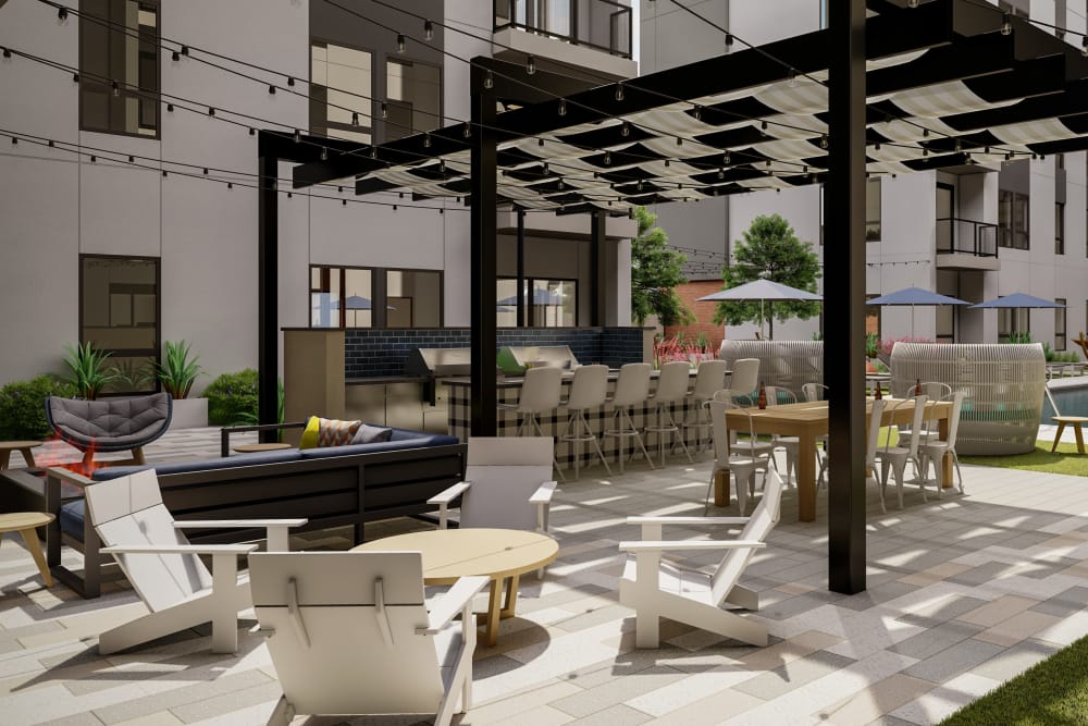 Comfortable seating outside around a gas-fueled firepit at The Astor at Osborn in Phoenix, Arizona