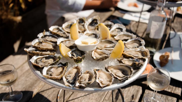 A plate of raw oysters served at a restaurant in South Jordan