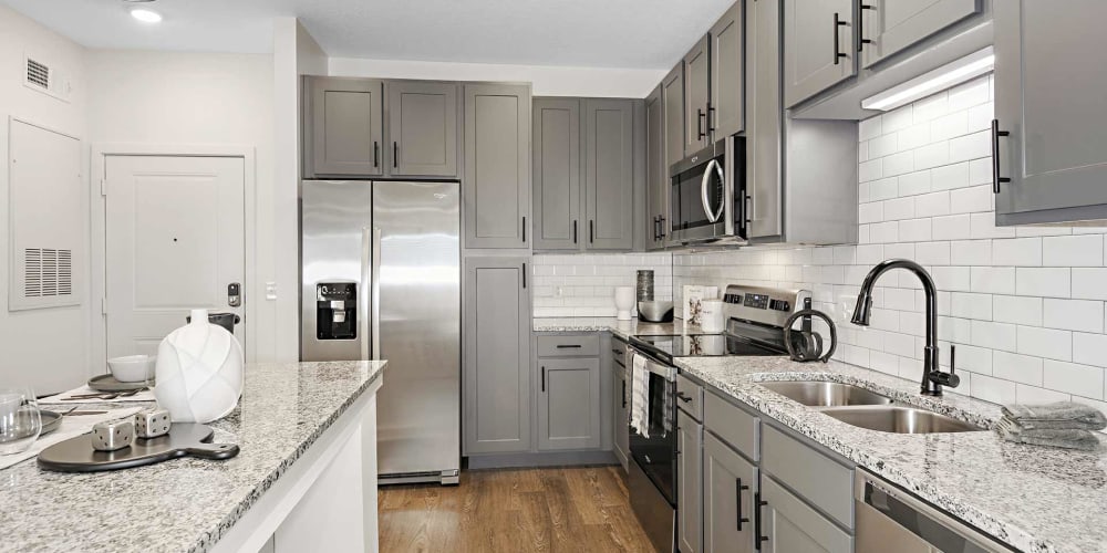 A spacious kitchen in an apartment at The Baldwin in Orlando, Florida