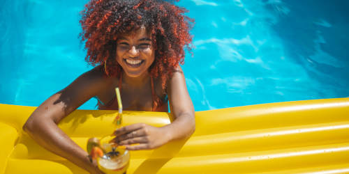 Woman relaxing by the pool at Mission Pointe in Jacksonville, Florida
