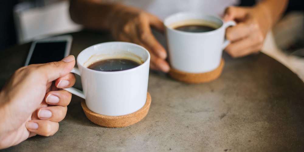 Residents having coffee in cafe near Laurel View in Concord, North Carolina