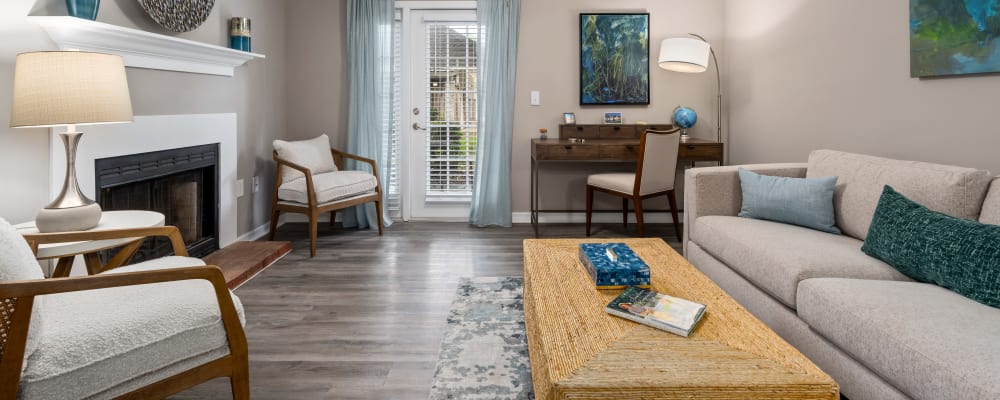 A furnished apartment living room at {Arbor Gates in Fairhope, Alabama