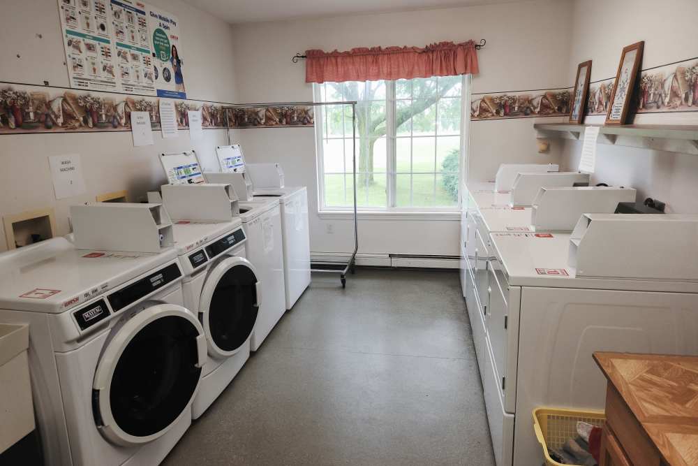 Community laundry facility at Woodbrook Apartments in Three Rivers, Michigan