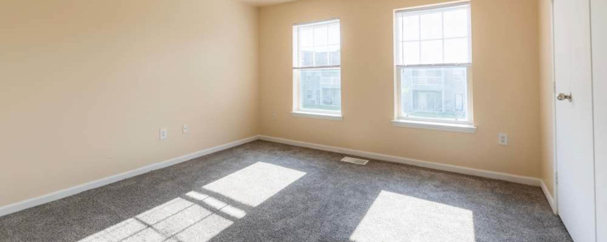 Bed room with large windows at Park Trails Apartments in Columbus, Ohio