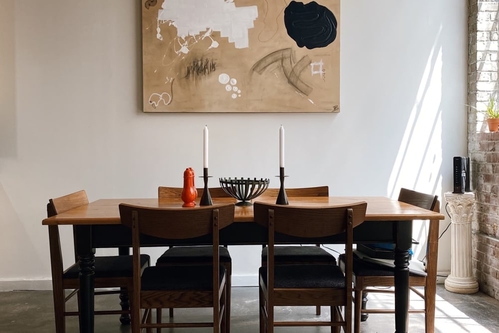 Dining room in apartment at Mattress Factory Lofts in Atlanta, Georgia