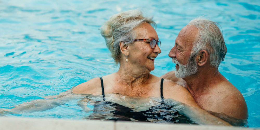 Residents enjoy a rejuvenating swim at The Residences at Monterra Commons in Cooper City, Florida