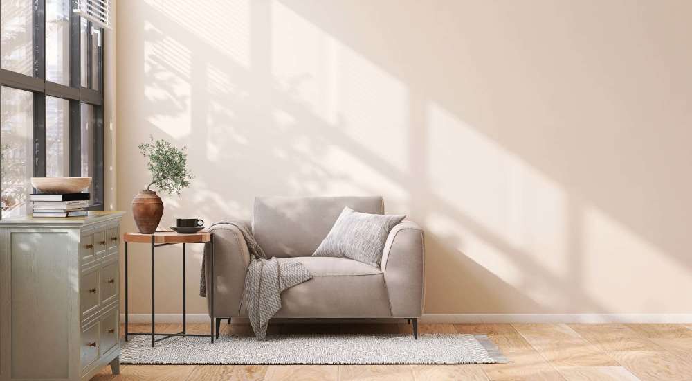 Living room with armchair at Coral Wood Court in Reseda, California
