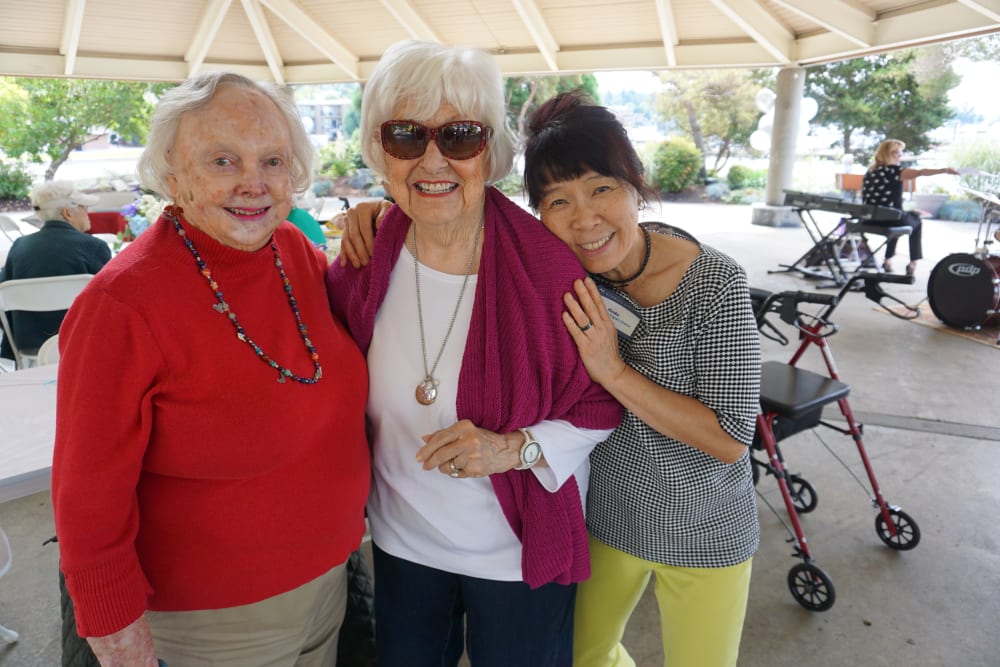 Ladies enjoying the annual picnic at the park near Merrill Gardens at Kirkland in Kirkland, Washington. 