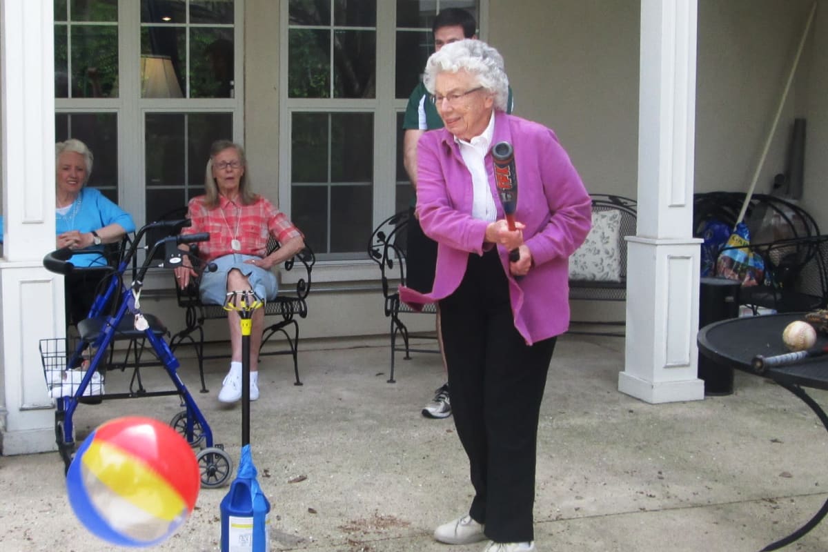 Residents playing games at Parsons House Preston Hollow in Dallas, Texas