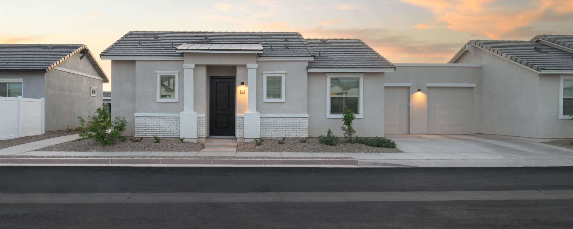 Homes with attached garages at Canopy at Cottonwood in Casa Grande, Arizona