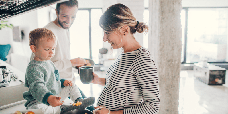 Pregnant mother smiling at child at  Heroes Manor in Camp Lejeune, North Carolina