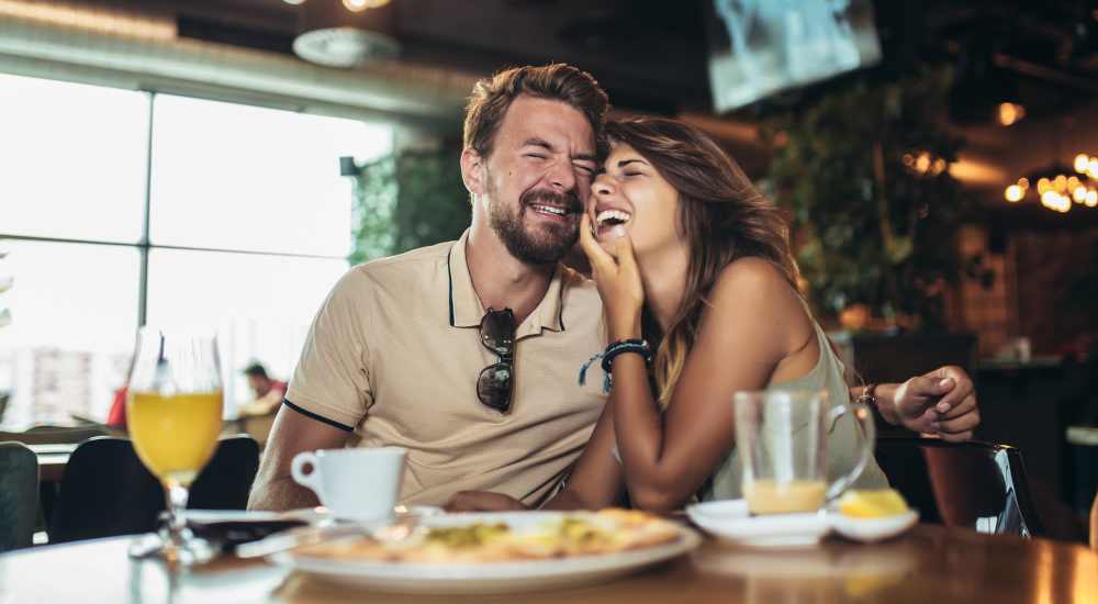 Couple having lunch at a restaurant near Verandas at Mitylene in Montgomery, Alabama
