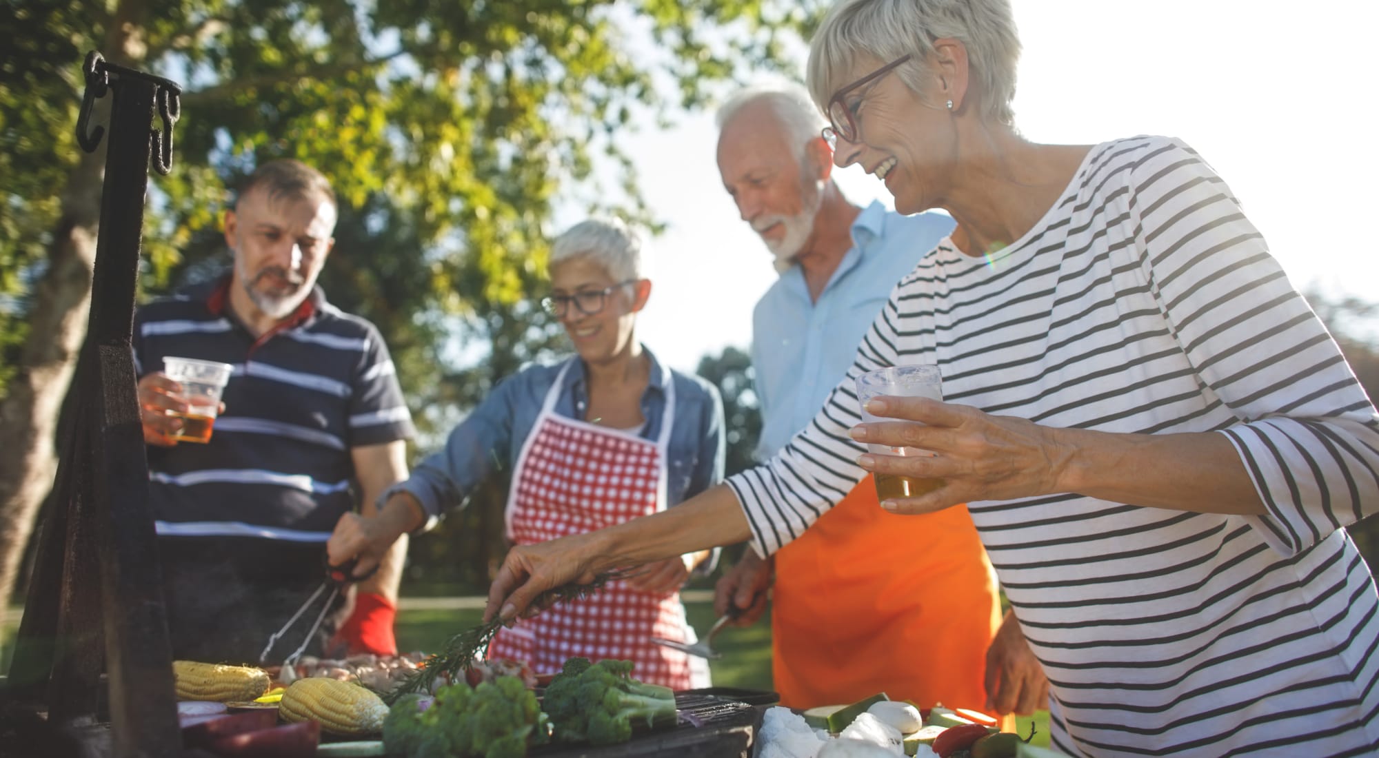 Residents grilling food at Estoria Cooperative Lakeville in Lakeville, Minnesota