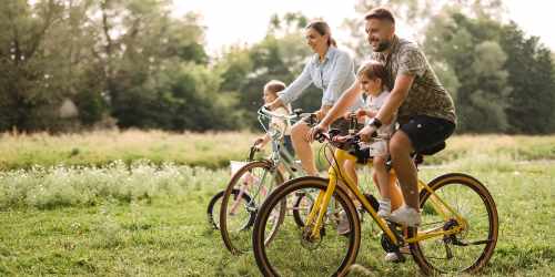 Residents cycling near Vanguard Apartments in Durham, North Carolina