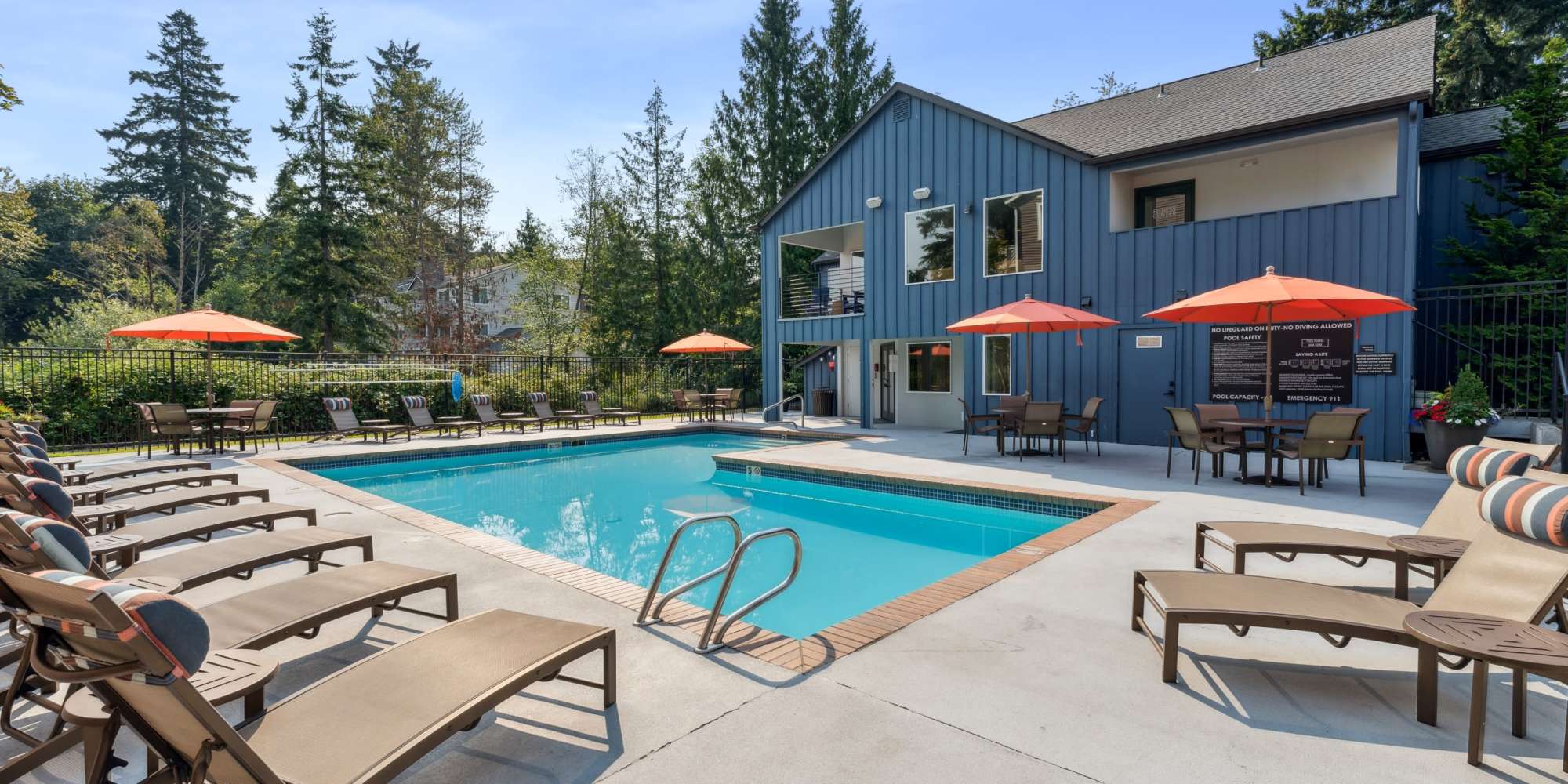Pool with lounge chairs at Sofi Lakeside in Everett, Washington