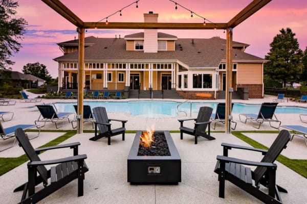 Outdoor lounge with fire pit at Nolan Living in Leawood, Kansas