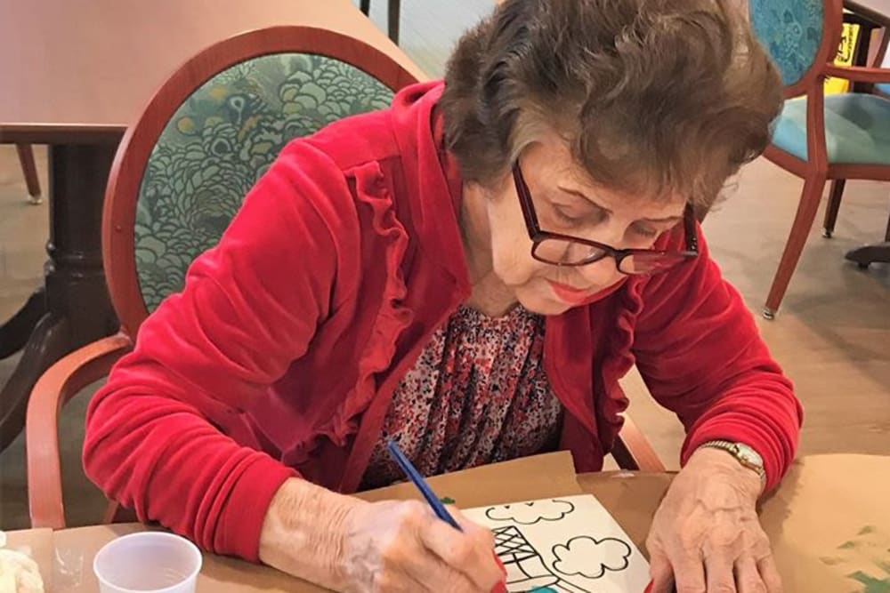 senior woman drawing