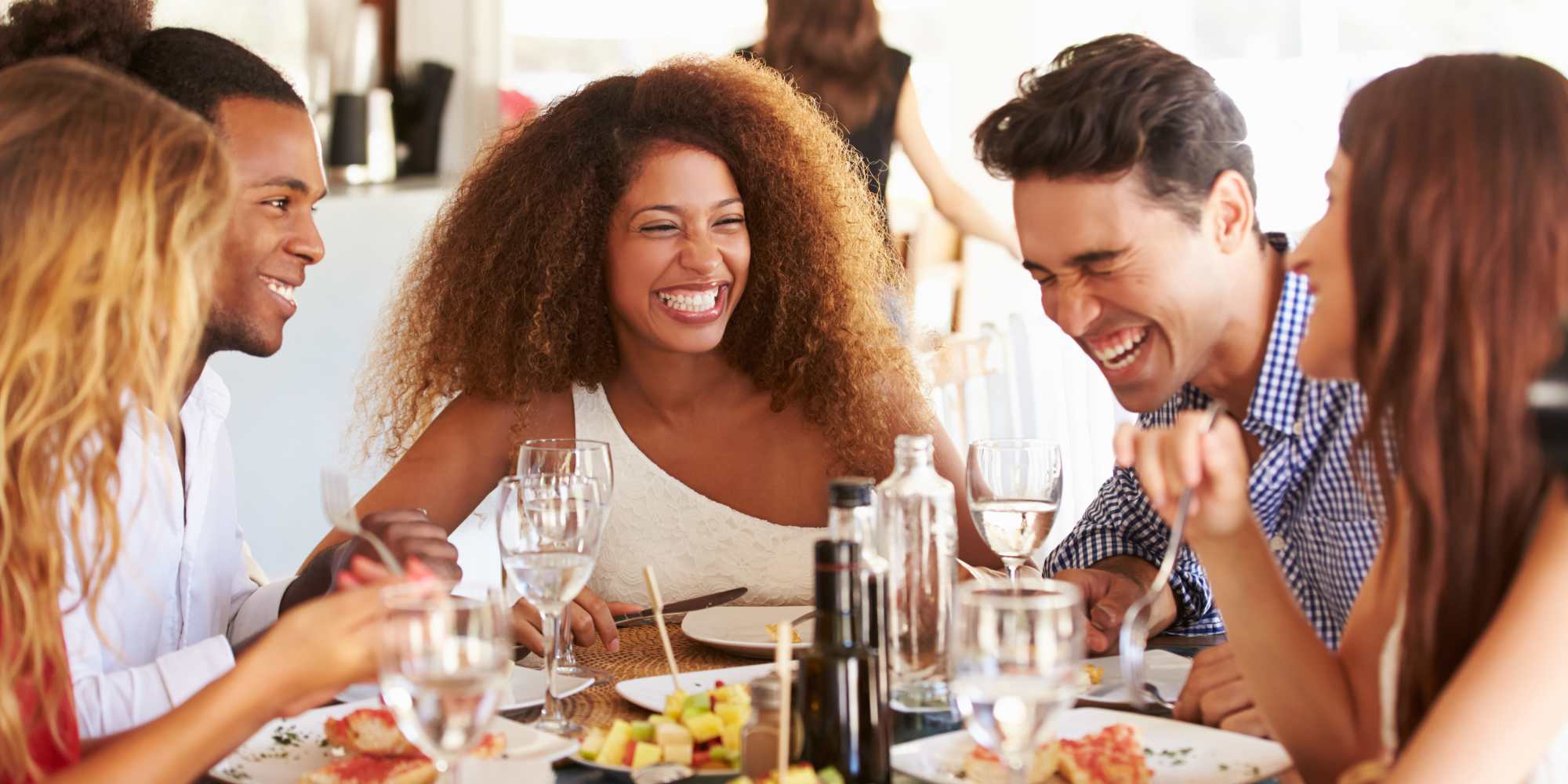Group of residents dining out at a restaurant near Tempo | The Residences At Evergreen Walk in South Windsor,Connecticut