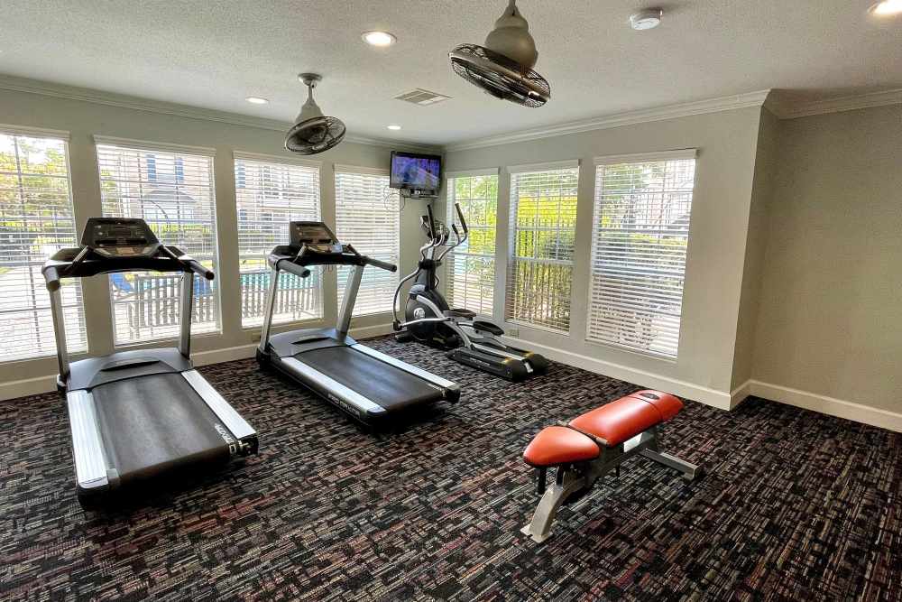 Modern fitness equipment at The Abbey at Champions in Houston, Texas