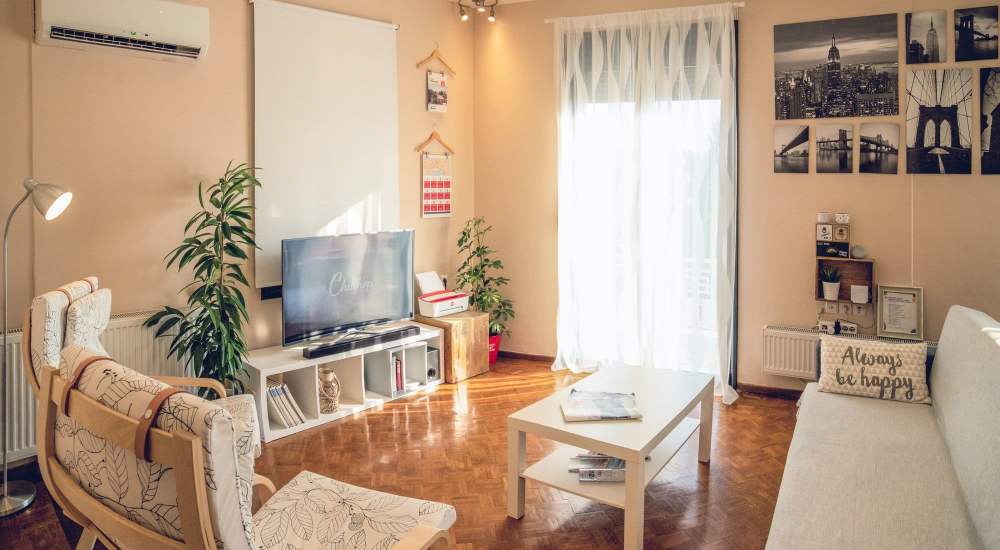 Living room with couch and tv at Sherman Park in Reseda, California 
