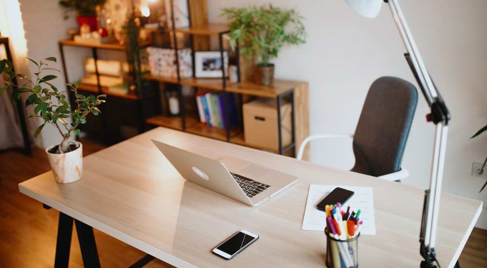 Home office workspace featuring a desk with a laptop at Country Oaks in Weatherford, Texas