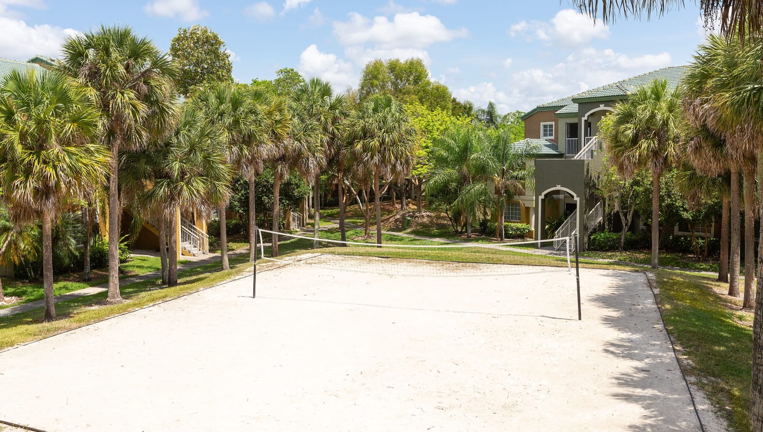 Sand volleyball court at Club Lake Pointe Apartments in Coral Springs, Florida