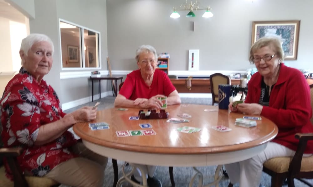 Residents playing cards at Mathison Retirement Community in Panama City, Florida