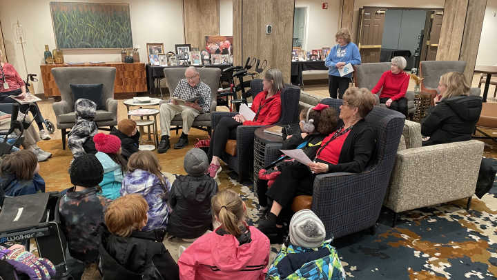 Residents visiting Eagles Elementary students