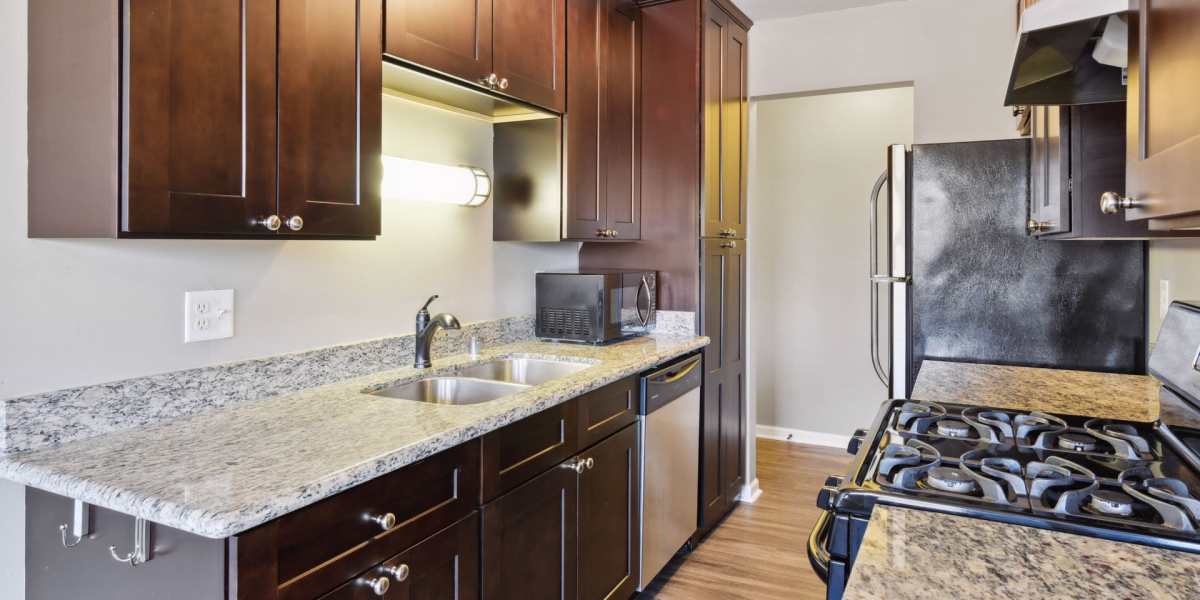 Kitchen with Granite Counters at West End Trails in Golden Valley, Minnesota