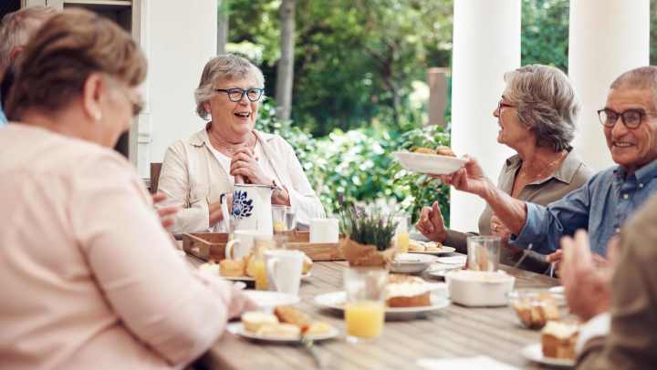 Residents eating snacks together