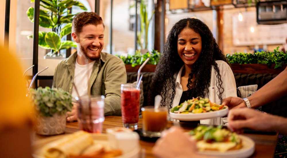 Friends having lunch at a restaurant near Dawcrest Apartments in Olympia, Washington