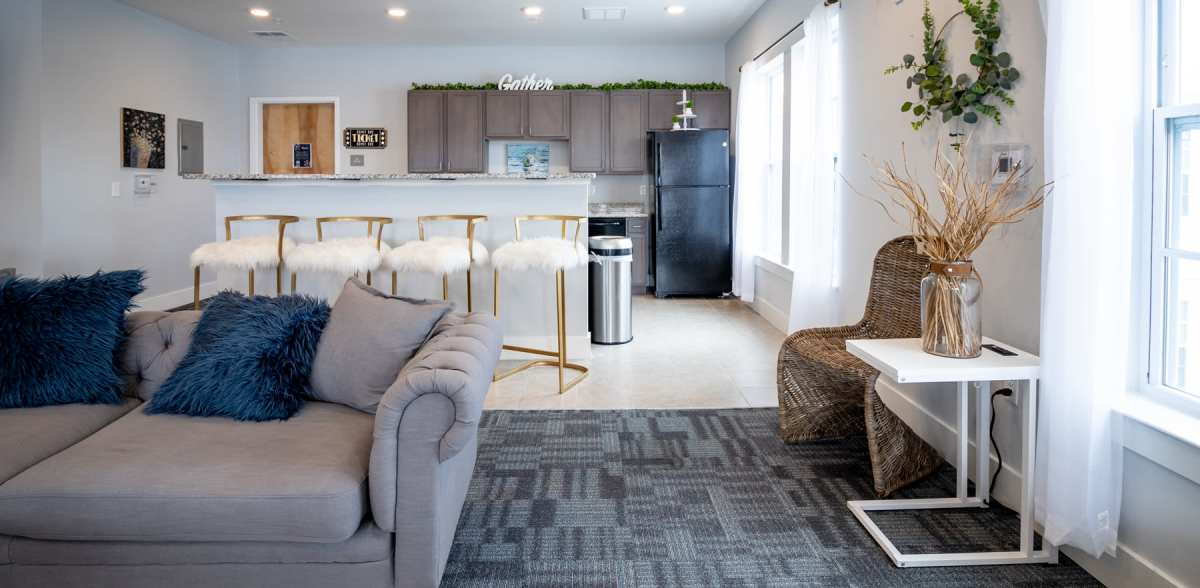 Clubhouse with a kitchen and seating area at Attain Shockoe, Richmond, Virginia