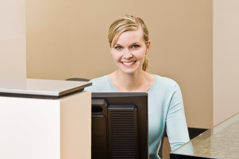 A women at the front desk at Oregon RV & Storage in Hubbard, Oregon