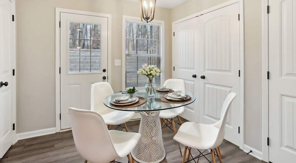 Modern kitchen with stainless-steel appliances like refrigerator and dishwasher at Center Pointe Townhomes in Clarksville, Tennessee