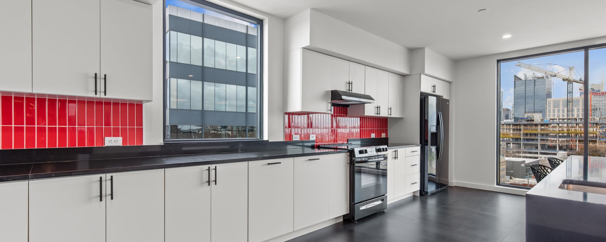 Kitchen with white cabinet at Rutledge Flats in Nashville, Tennessee