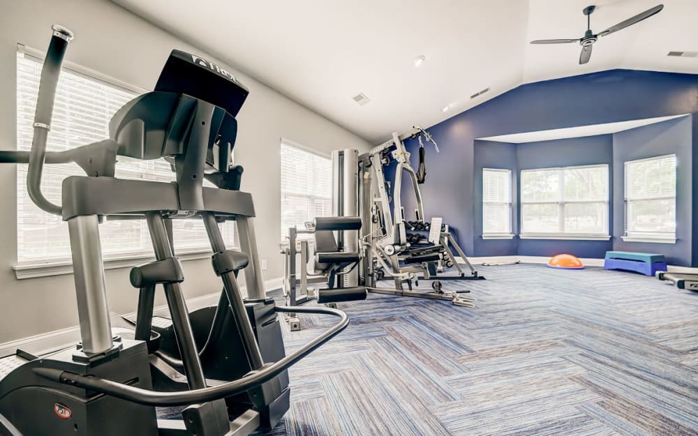 Well-equipped fitness center with cardio equipment at The Overlook at Golden Hills in Lexington, South Carolina