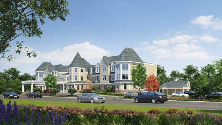 Exterior community rendering image with building and sky. 