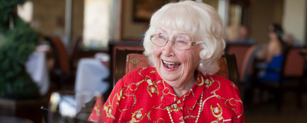 A smiling resident at The Vistas Assisted Living and Memory Care in Redding, California