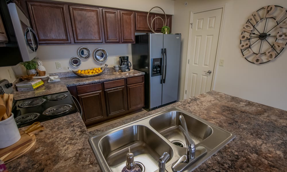 An apartment kitchen at Tuscany Hills in Tulsa, Oklahoma