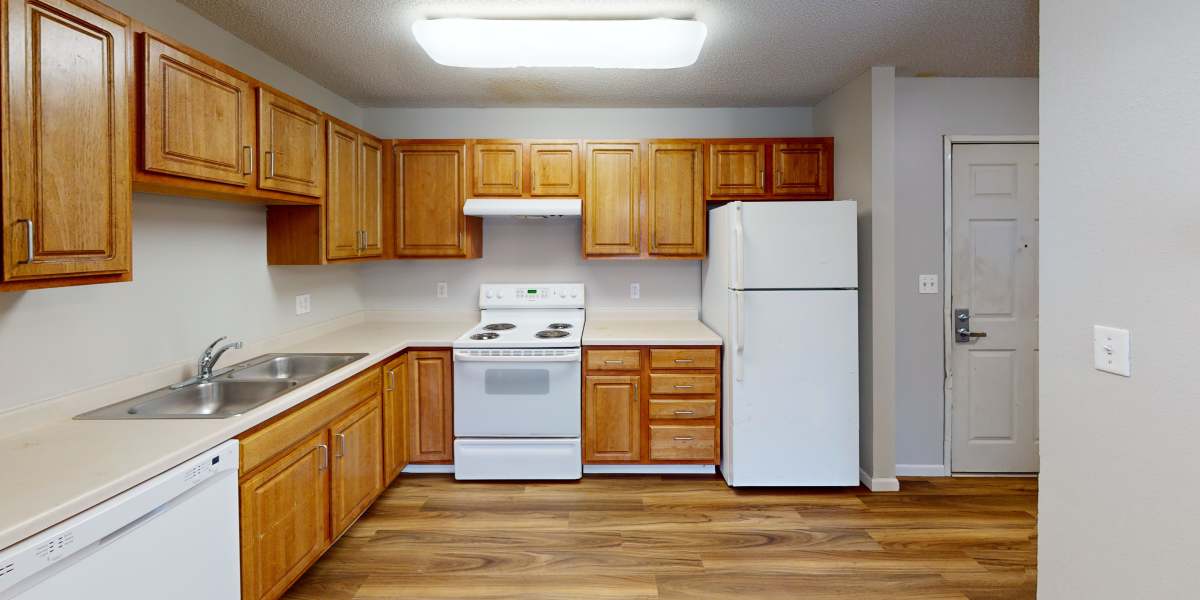Kitchen in a model home at Sibley Cove Apartments in Maplewood, Minnesota
