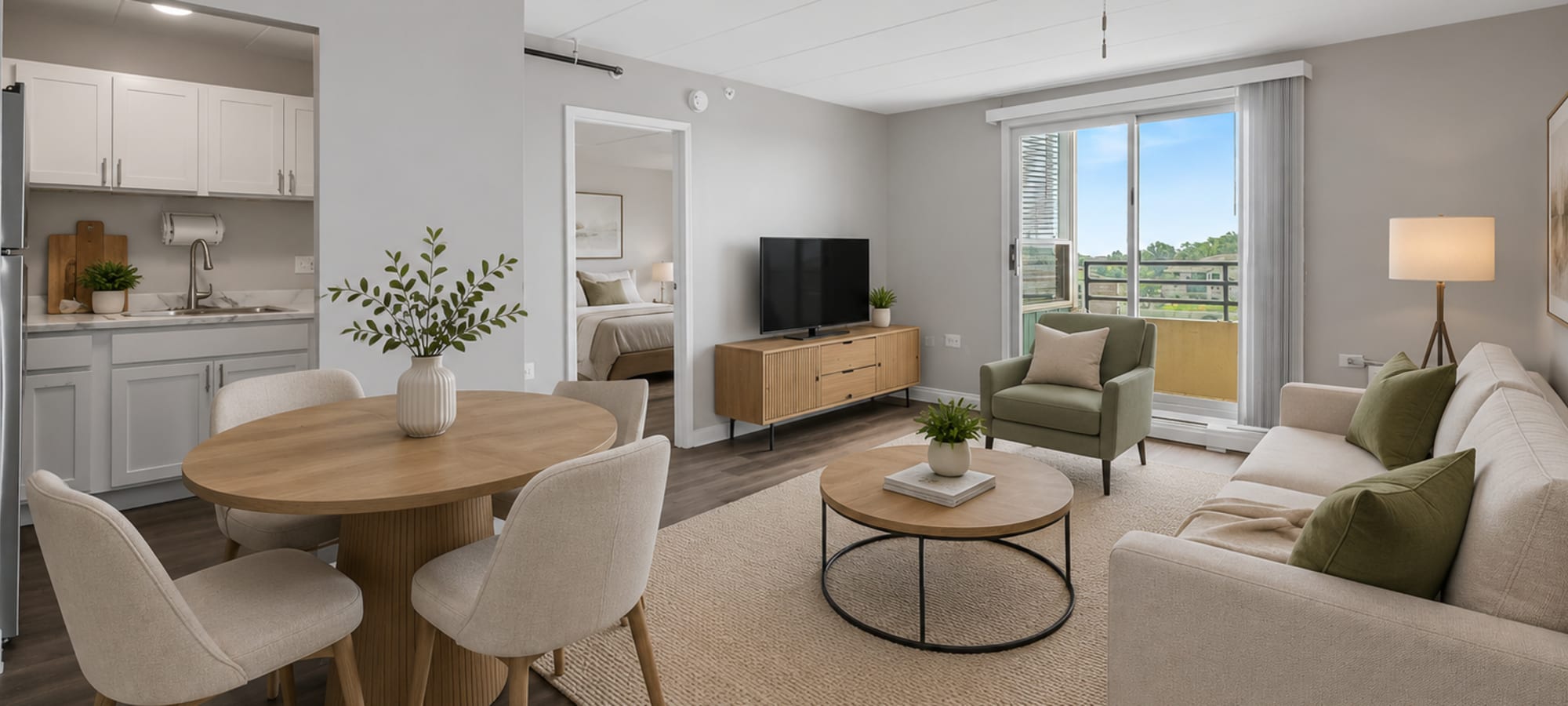Living room with television at Edenbridge Apartments in Tinley Park, Illinois