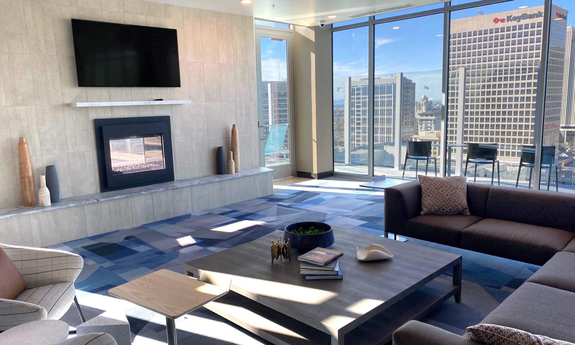 Rooftop clubroom with fireplace and television of Liberty SKY in Salt Lake City, Utah